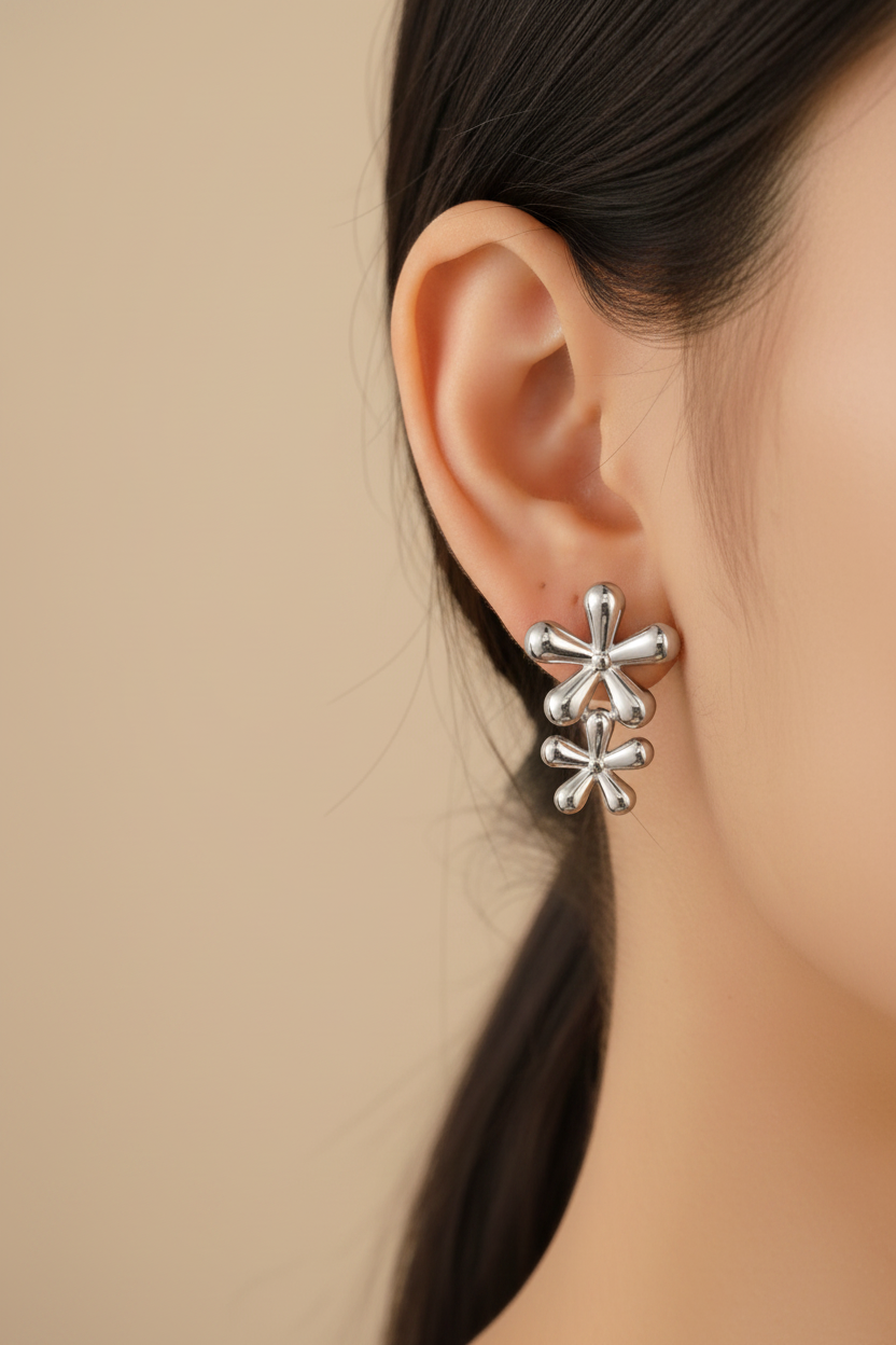 Flower studs on ear